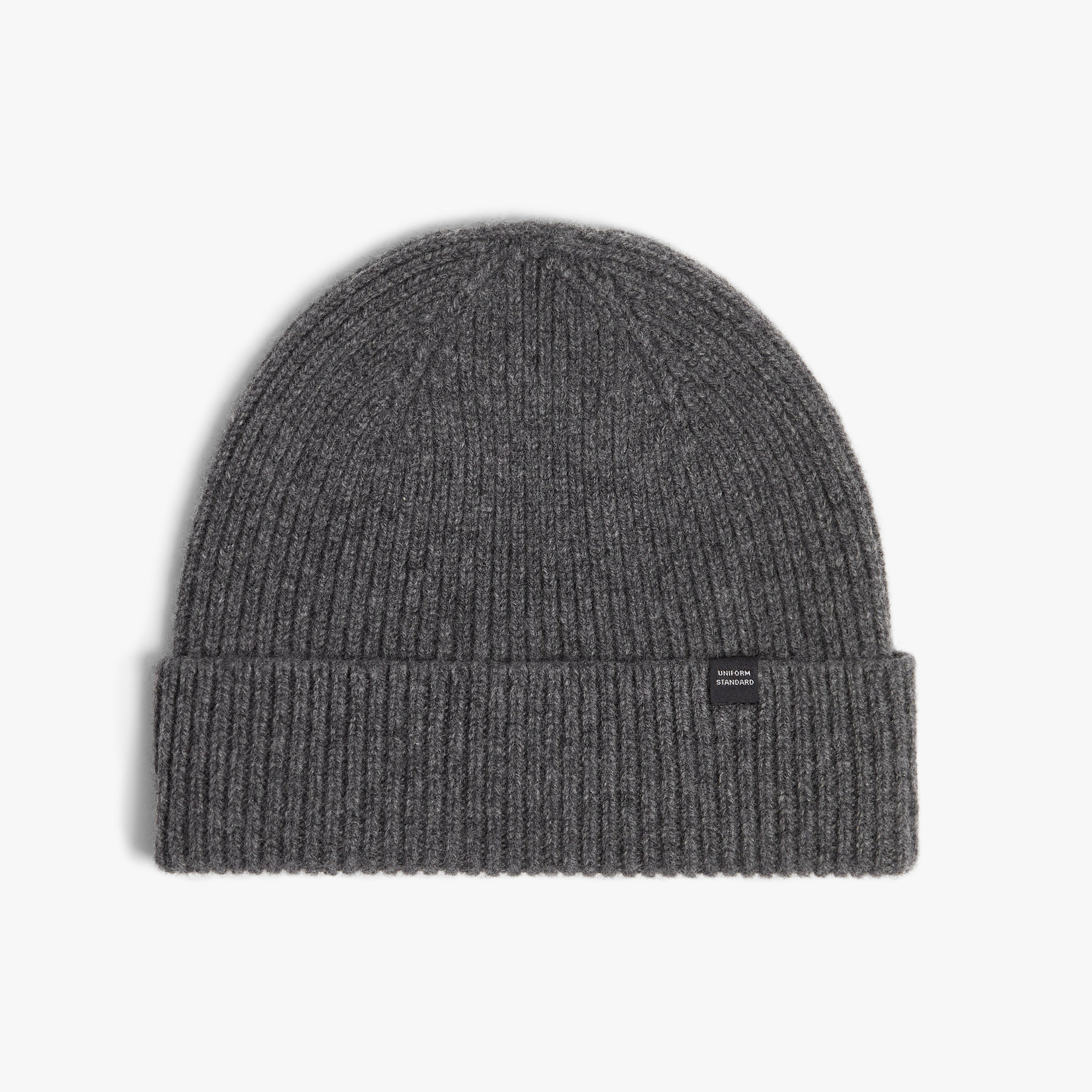 Gray knit beanie with a brand logo on a light gray background