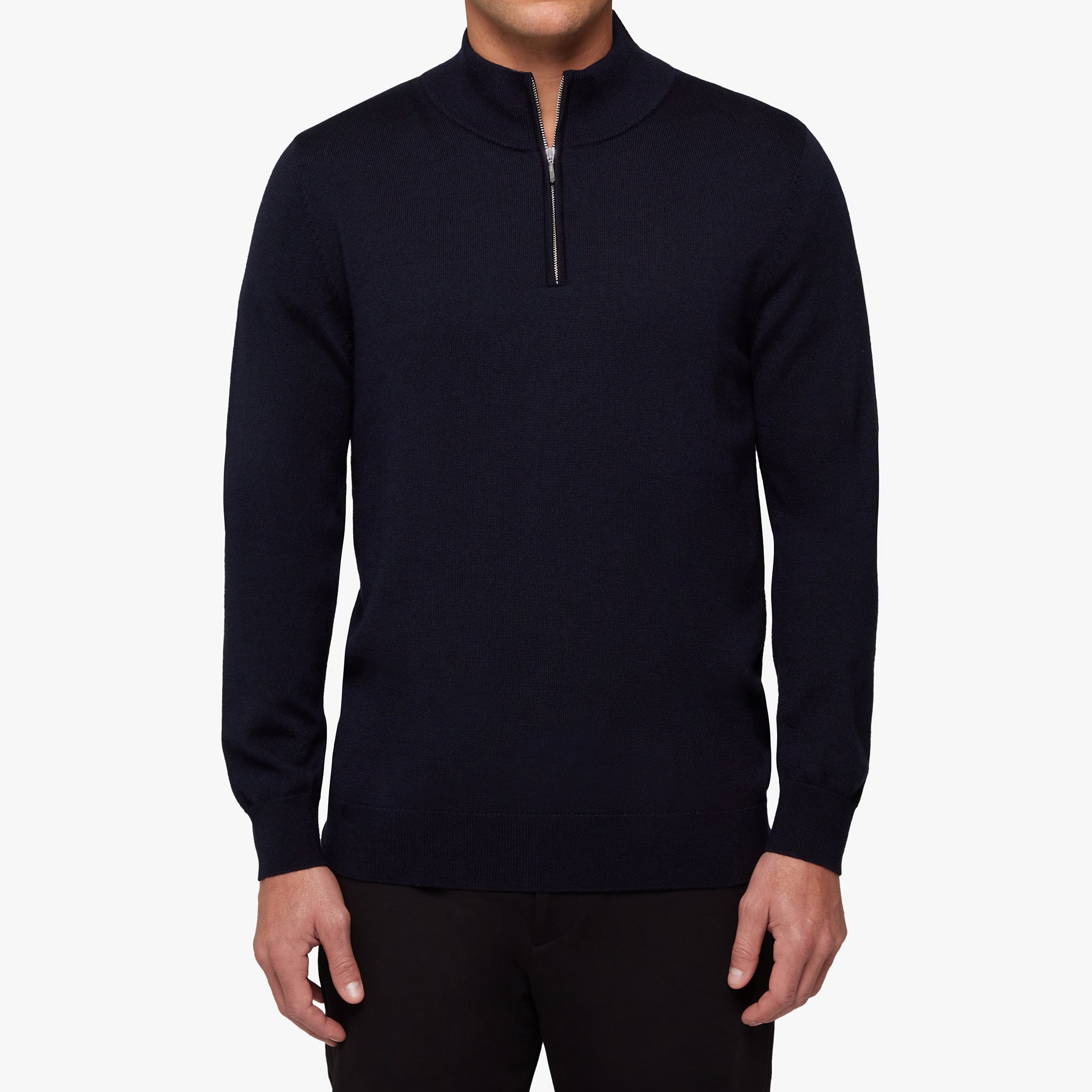 Black quarter-zip sweater worn by a person on a white background