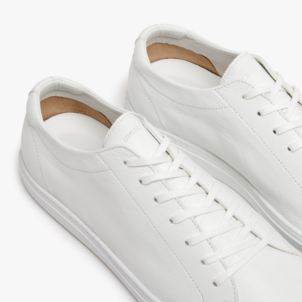 Women's Relaxed Sneaker Triple White heel and tongue detail