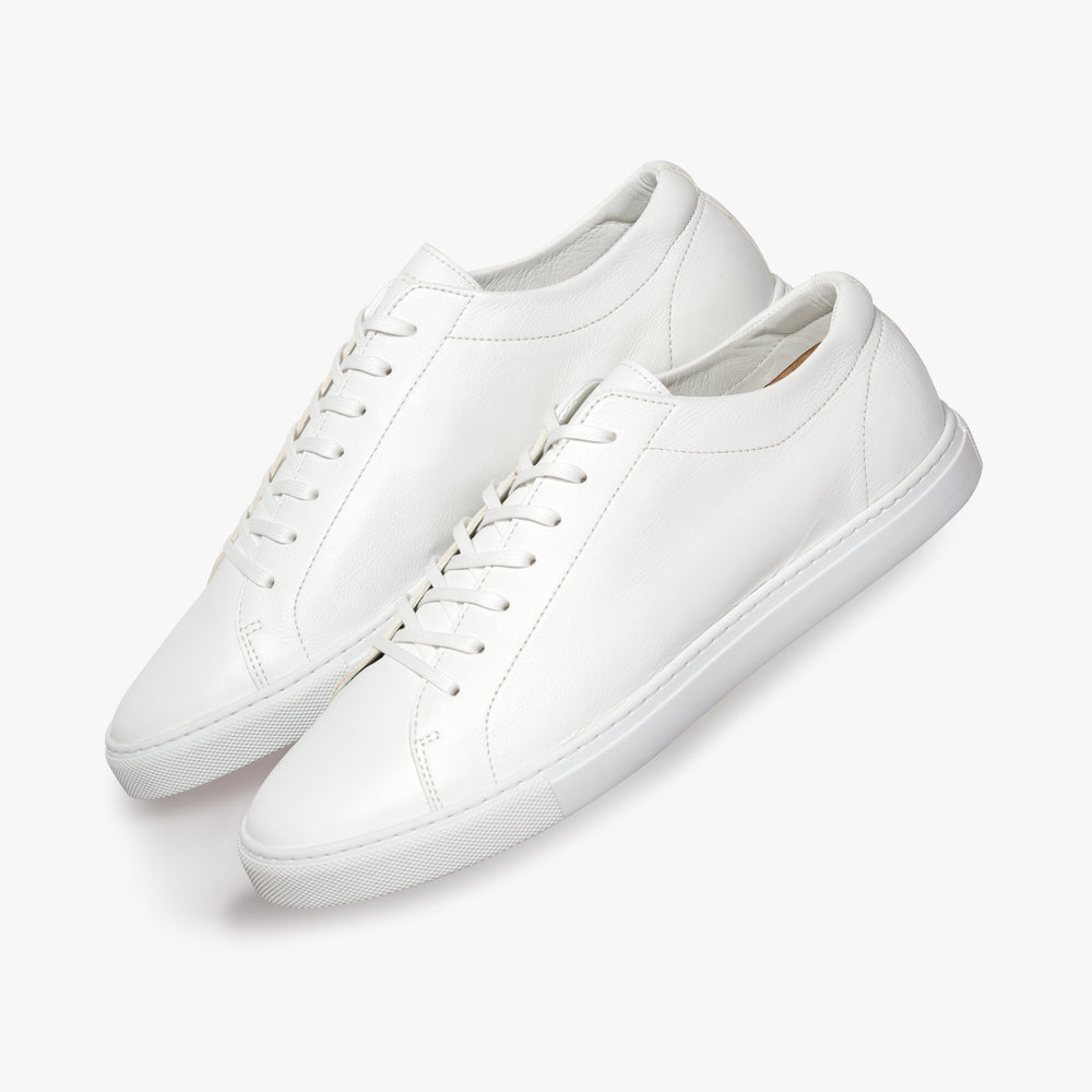Uniform Standard Relaxed Sneaker Triple White Leather close up