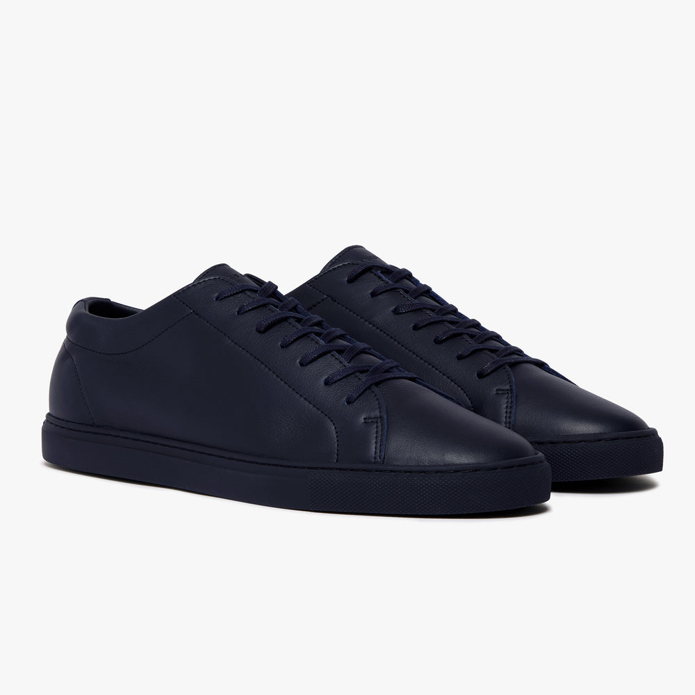 Men's Relaxed Sneaker Triple Navy heel and tongue detail